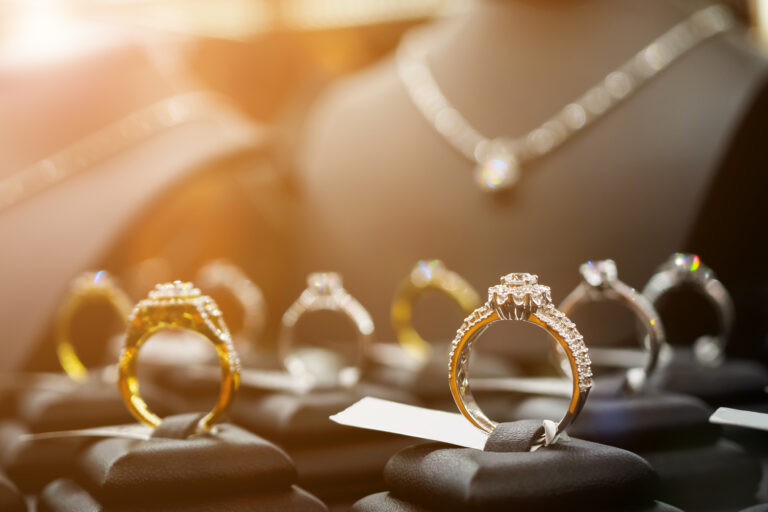 Wedding ring display at jewelry store - stock photo - piman khrutmuang