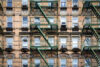 Windows and fire escape on old building in new york city