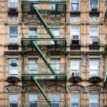 Windows and Fire Escape on Old Building in New York City