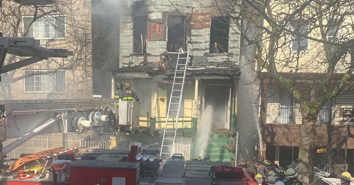 Firefighters at three-alarm fire in the Bronx