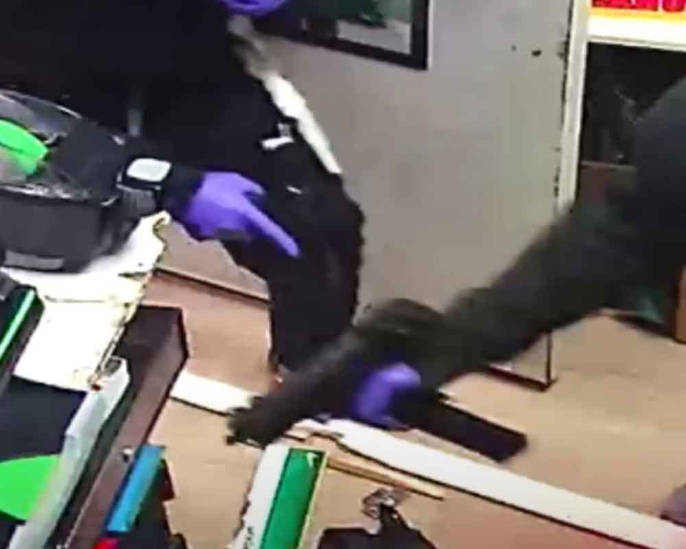 Armed robbers hit Southwest Philly gas station