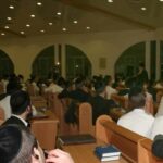 Men study and pray at Orthodox Jewish Yeshiva