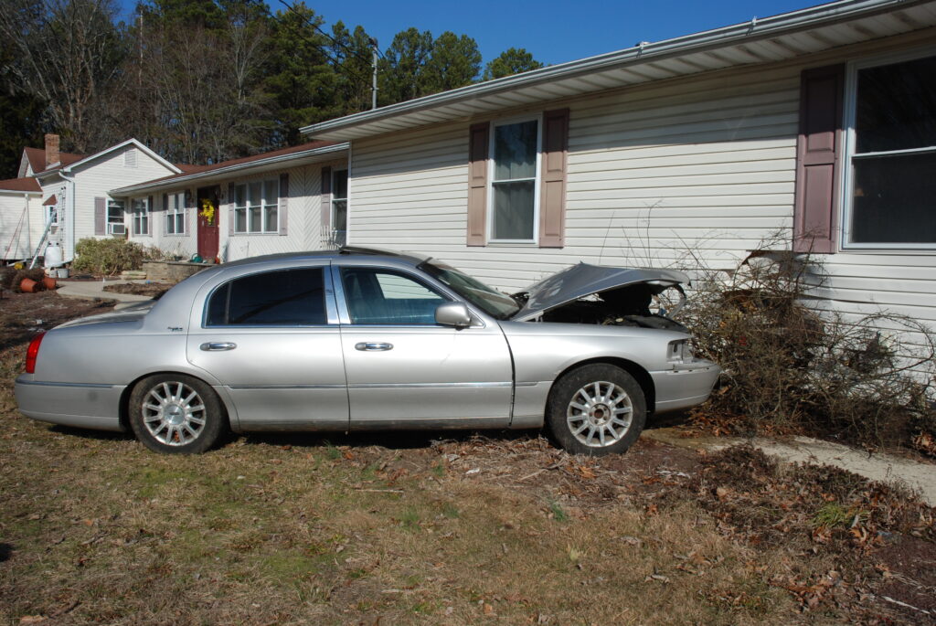 Suspected intoxicated driver takes down utility pole, strikes home at Jackson-Manchester border