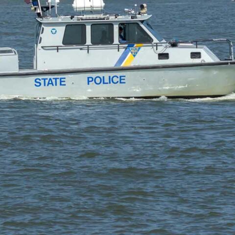 Ironworkers on route 37 bridge assist in rescue of distressed kayaker in barnegat bay - photo licensed by shore news network.
