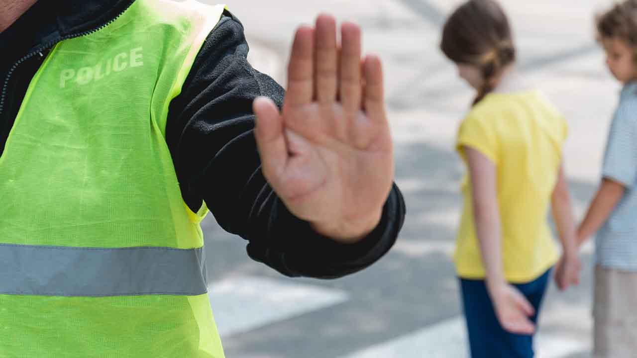 Burlington school crossing guard is fighting for their life after being struck by car in a marked crosswalk