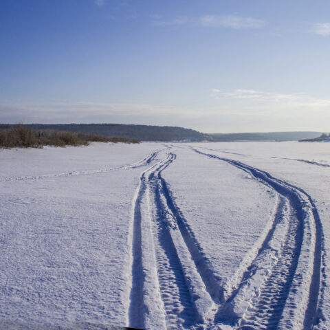 New york police searching for missing man after snowmobile found abandoned on icy saranac river - photo licensed by shore news network.