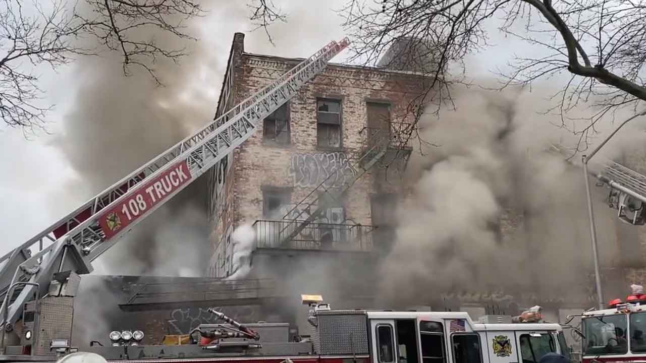 Firefighters battle four-alarm fire in Brooklyn