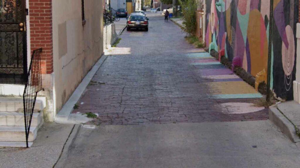 Police say woman abandoned child in Baltimore alleyway