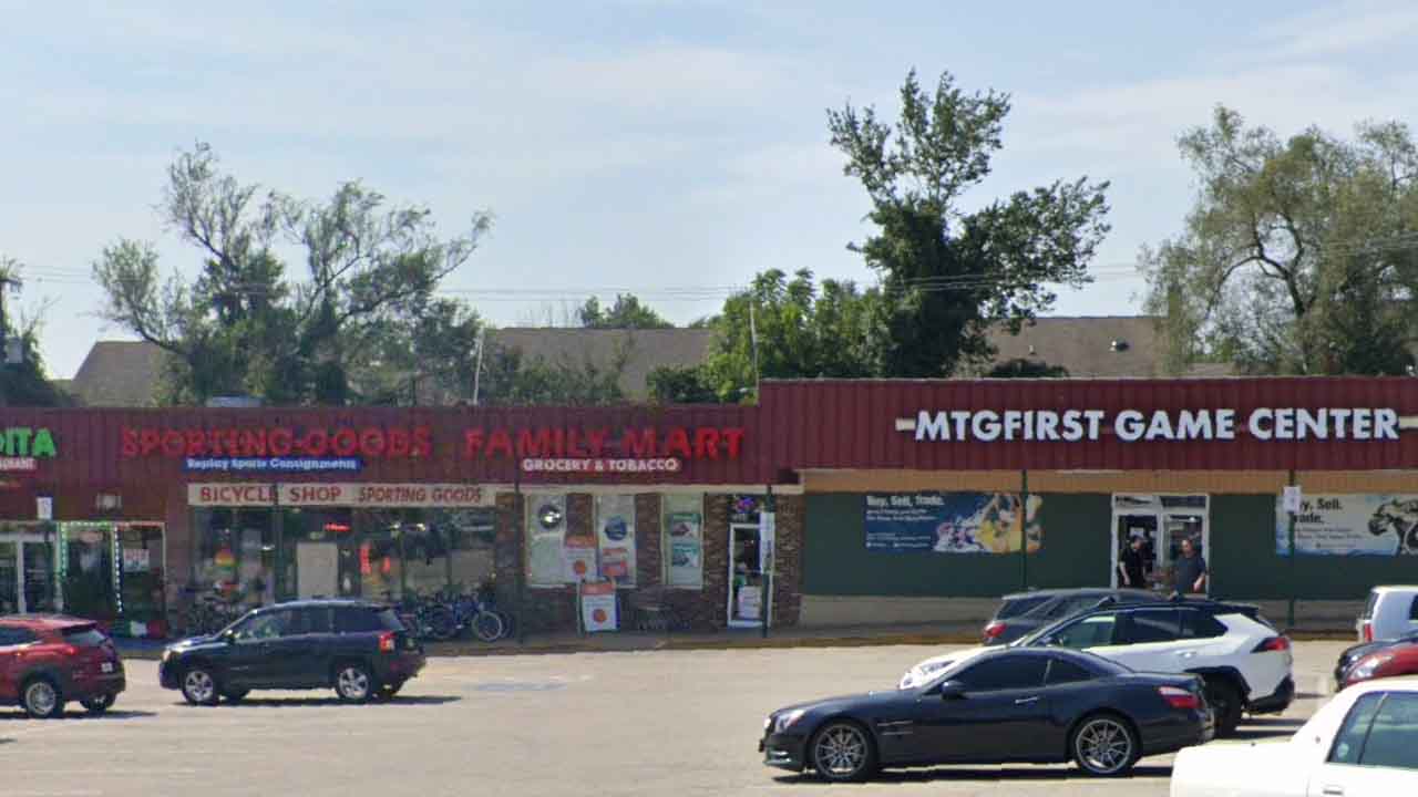 Female grocery store employee robbed, forced to the ground at gunpoint