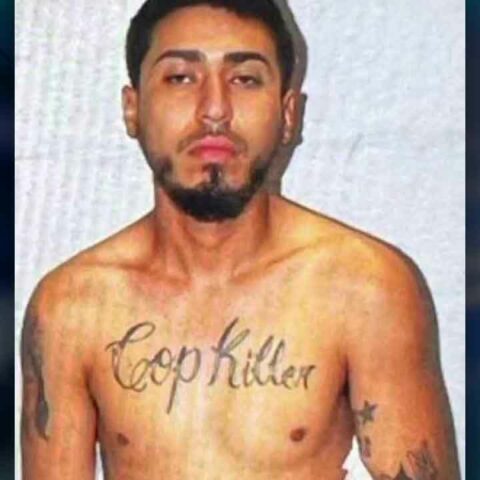 Suspect with "cop killer" tattoo arrested for shooting at cop - photo licensed by shore news network.