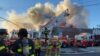 Firefighters battle blaze at queens auto parts store