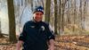 Nyc cop puts out brush fire at staten island high school