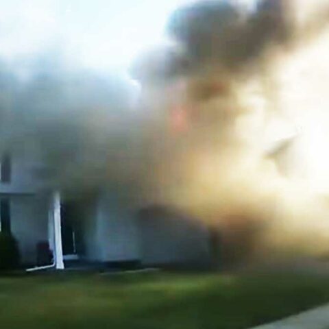 Caught on camera: cop's quick actions saved homeowner, neighbor during fire - photo licensed by shore news network.