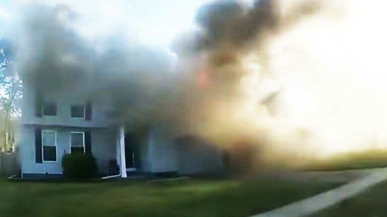 Caught on camera: cop's quick actions saved homeowner, neighbor during fire - photo licensed by shore news network.