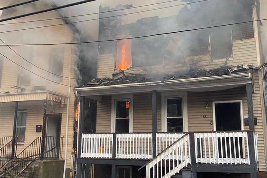 Early morning three-alarm fire displaces sixteen people in Newark