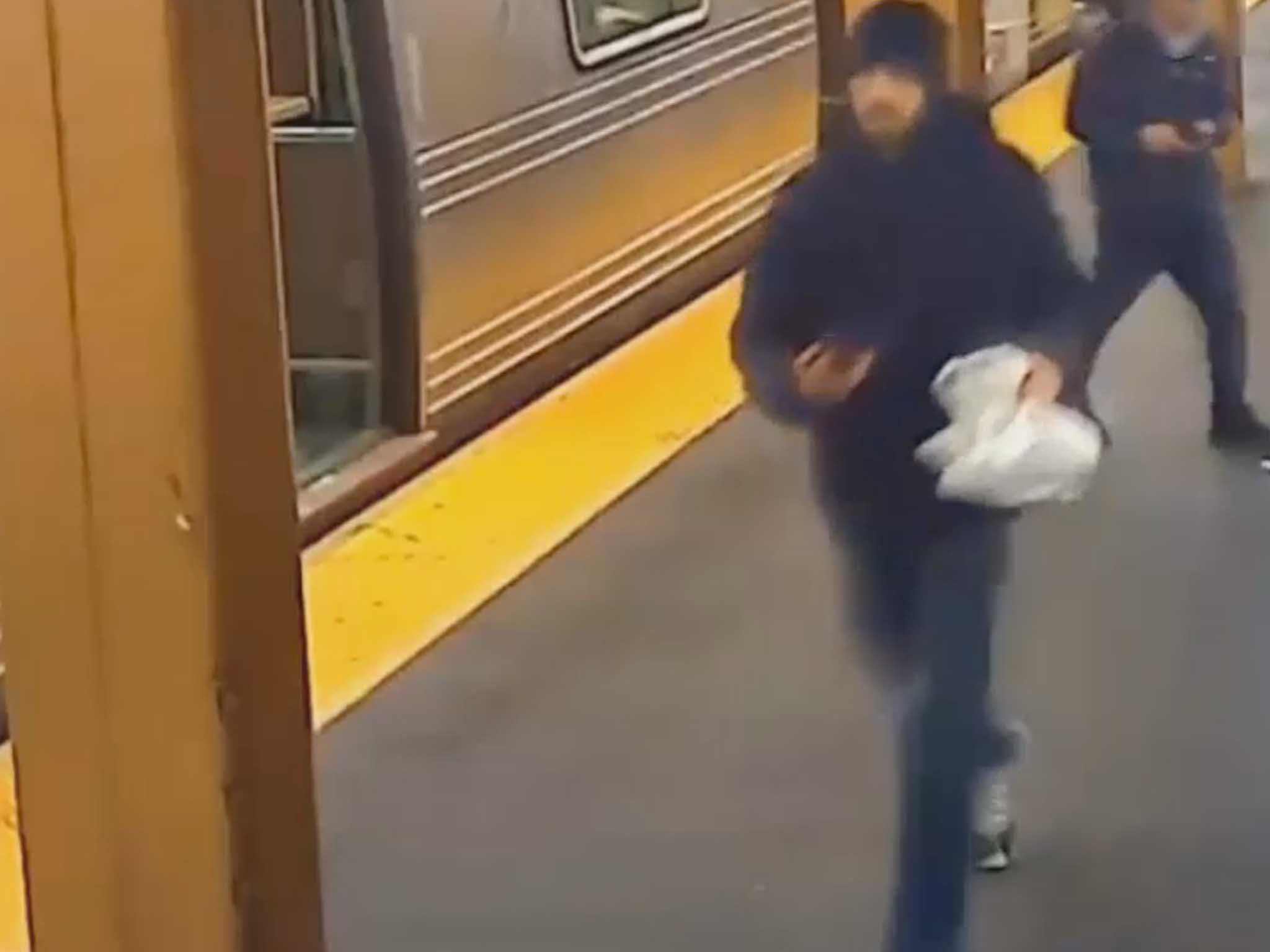 Man shoved into moving train inside NYC subway station