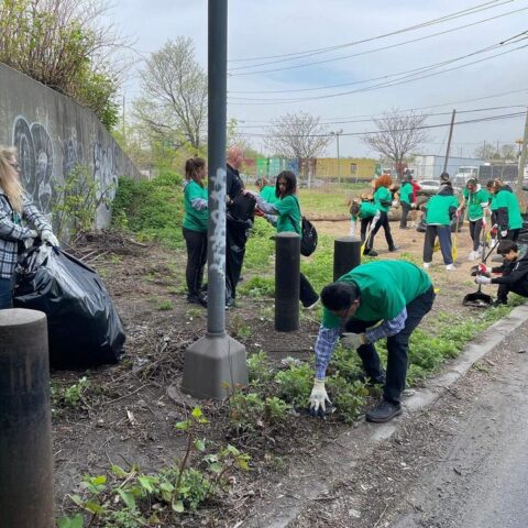 Newark students roll up sleeves to clean their neighborhood on earth day with police, leaders - photo licensed by shore news network.