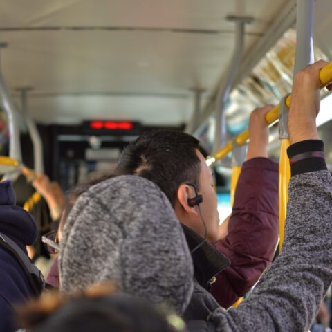 Nyc forced to cut costs as influx of migrants bused in - photo licensed by shore news network.