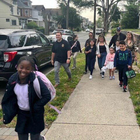 Belleville officers participate in walk to school with a cop day - photo licensed by shore news network.