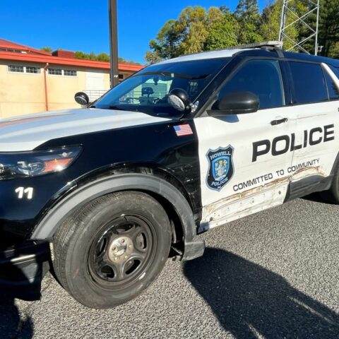 Howell police officers avoid injury after cruisers struck by passing vehicle - photo licensed by shore news network.
