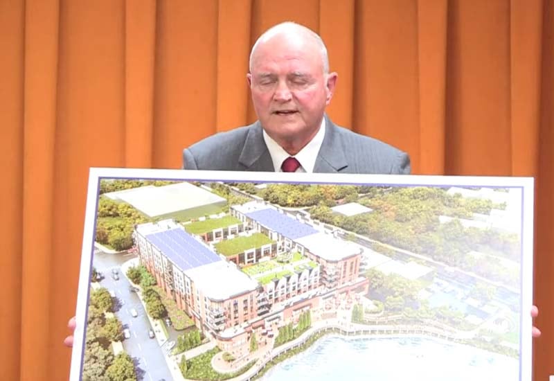 Critics Call Hill 10-Story Twin Tower Redesign an 'Election Scam'