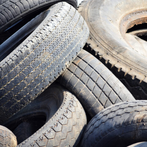 Illegal tire dumping suspect as akron officials deal with cleanup of over 4,000 tires citywide - photo licensed by shore news network.