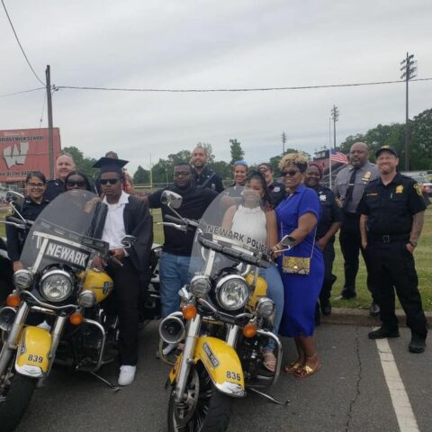 Newark police commemorate high school graduation of fallen officer's son - photo licensed by shore news network.