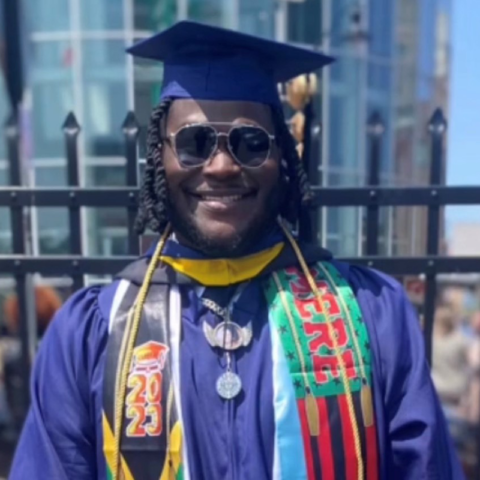 After losing both parents to covid-19 new jersey student graduates at the top - photo licensed by shore news network.