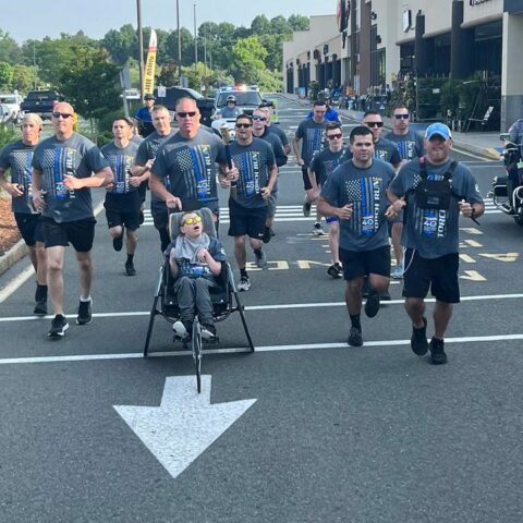 Jackson police officer kick off 40th anniversary special olympics torch run - photo licensed by shore news network.