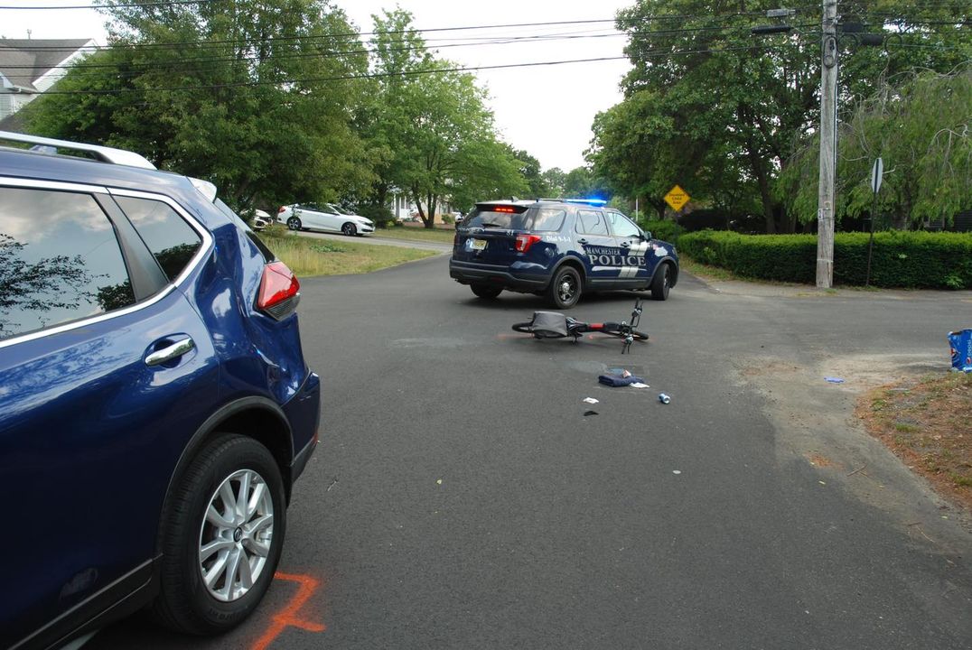 51-year-old on e-bike struck by car after failing to stop at intersection