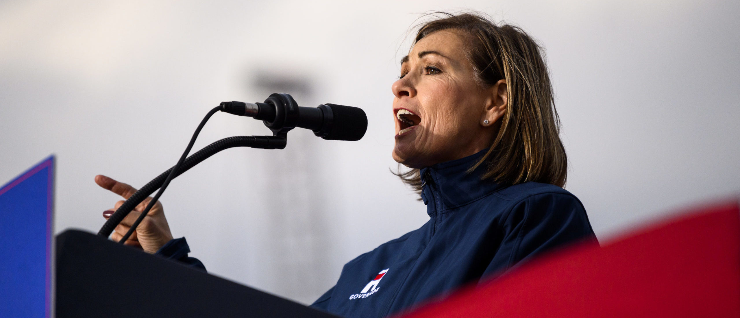 Governor Kim Reynolds (R-IA) speaks during a campaign event at Sioux Gateway Airport on November 3, 2022 in Sioux City, Iowa. Former U.S. President Donald Trump held a rally for Iowa GOP candidates ahead of the state's midterm election on November 8th. (Photo by Stephen Maturen/Getty Images)