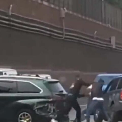 Assault after crash on bqe caught on camera - photo licensed by shore news network.