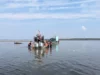 11 rescued by coast guard after boat capsizes in oregon inlet