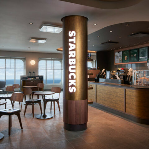 Starbucks collector mugs available on cruise ships - photo licensed by shore news network.