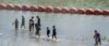 Biden admin sues texas over floating border barrier
