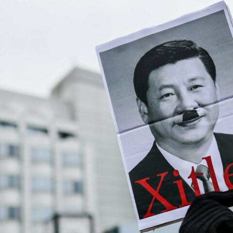 Political dissident flees communist china on jet ski after likening xi jinping to adolf hitler - photo licensed by shore news network.