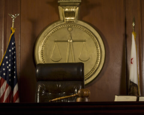 Judge Seat And Gavel In Court Room