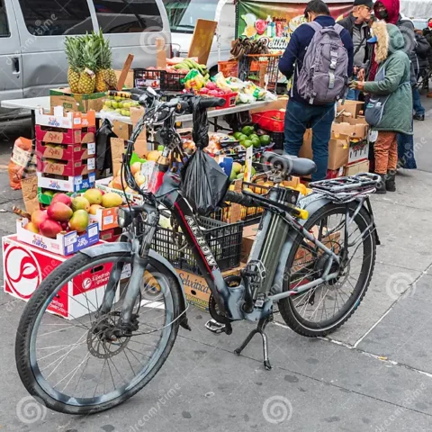 Man punched off e-bike during robbery in the bronx - photo licensed by shore news network.