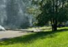 Fiery car crash shuts down road; causes power outage