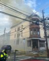 Man rescued from burning building by newark firefighters