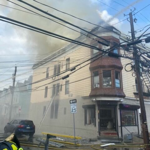 Man rescued from burning building by newark firefighters - photo licensed by shore news network.