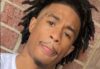 July murder suspect at large, reward offered