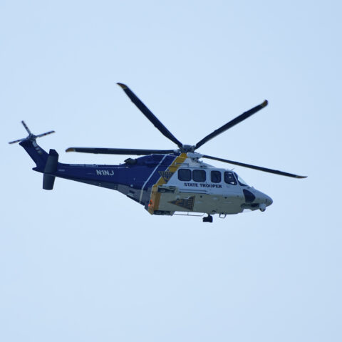 Beachgoers form human chain in attempt to rescue drowned man in new jersey - photo licensed by shore news network.