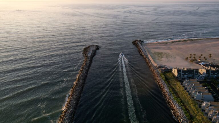 Two boaters rescued after crashing into rocks at manasquan inlet - photo licensed by shore news network.