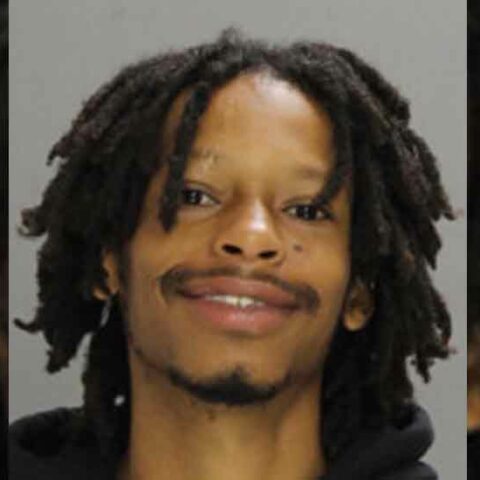 Carjacking suspect smiles for mugshot in sharon hill - photo licensed by shore news network.