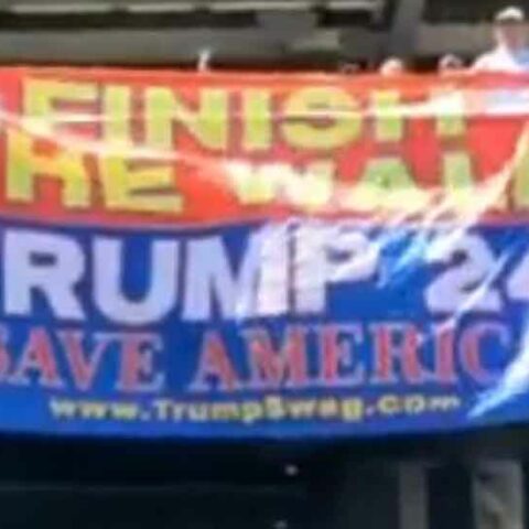 Watch: yankees fans unfurl massive trump flag during 7th inning stretch - photo licensed by shore news network.