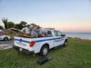Newport police officers join beach cleanup with community volunteers