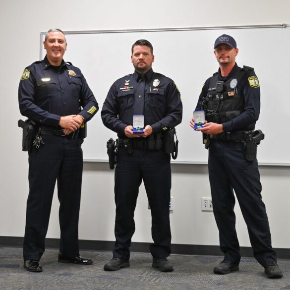 Virginia beach police officers awarded life saving medal for heroic rescue - photo licensed by shore news network.