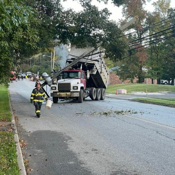 Dump truck takes down utility pole in cherry hill - photo licensed by shore news network.