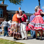 Senior Citizens Square Dance At Outdoor Event